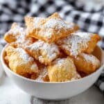 Homemade Beignets: Soft, Pillowy Fried Pastries Dustéd in Powdered Sugar Recipe
