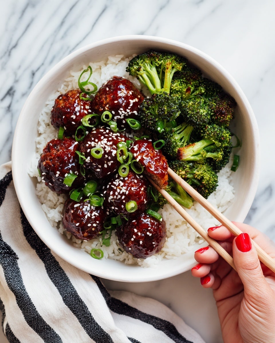 The image shows a close-up of a white pot filled with dark, shiny sauce covering nine round meatballs. The sauce is deep brown with a glossy texture, pooling around the evenly sized meatballs. Scattered on top are small white sesame seeds and bright green sliced scallions, adding contrast with their crisp, fresh look. The pot edges have slight browning from cooking, and the pot rests on a white marbled surface. The lighting highlights the moist texture of the sauce and meatballs, making the dish appear rich and savory photo taken with an iphone --ar 4:5 --v 7