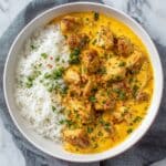 Creamy Baked Chicken and Rice with Cheddar Parmesan Sauce Recipe
