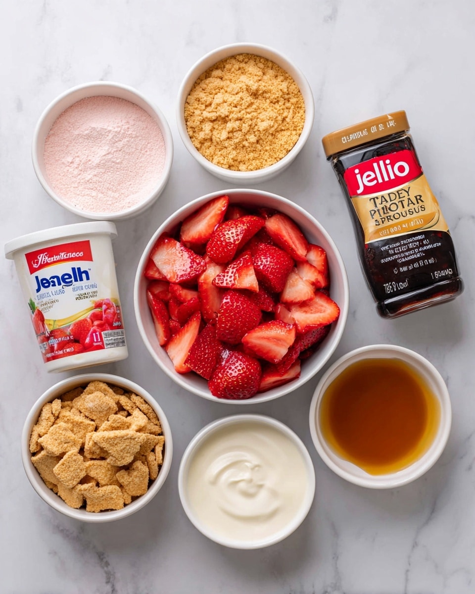 The image shows seven small white bowls placed on a white marbled surface. The largest bowl in the center holds fresh, sliced strawberries that are bright red and juicy. Surrounding it are six smaller white bowls arranged neatly: one filled with a fine pink powder labeled