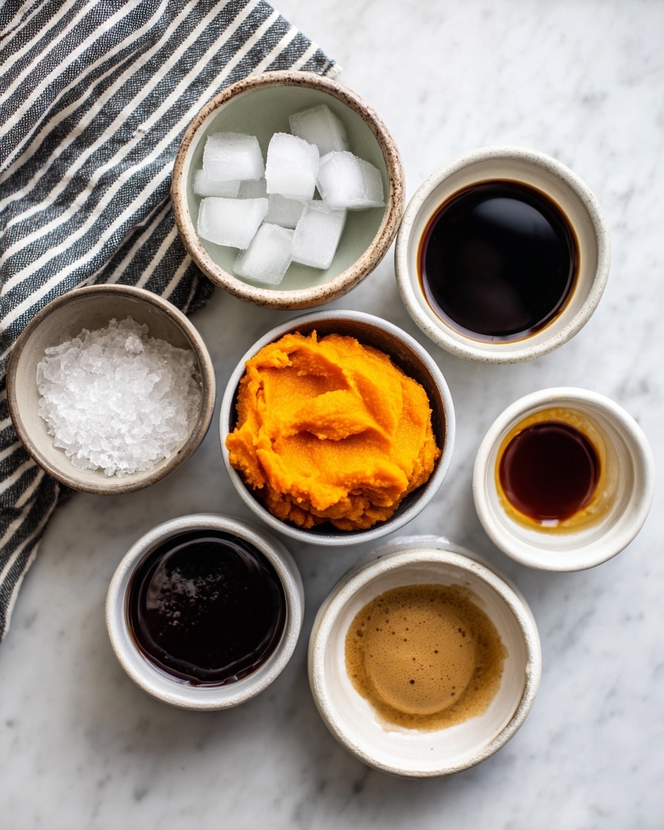 The image shows seven small bowls on a white marbled surface with a striped cloth in the background. The bowls contain different ingredients: one bowl with plain ice cubes, another with white oat milk, a bowl with smooth bright orange pumpkin puree at the center, a small bowl of dark vanilla extract, a bowl of shiny deep brown maple syrup, and a cup with very dark strong coffee. Each ingredient is neatly arranged in small white bowls or containers, placed around the pumpkin in the middle. photo taken with an iphone --ar 4:5 --v 7