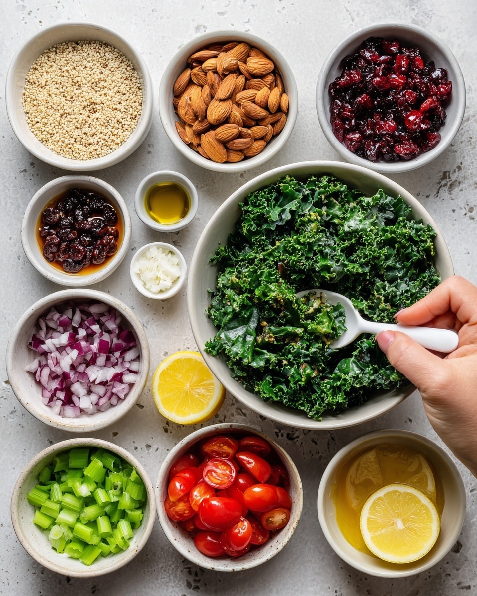 The image shows a white marble surface with nine small white bowls arranged neatly, each containing a different ingredient. One bowl holds pale beige quinoa grains, another is filled with dark red dried cranberries, and a third displays light tan sliced almonds. A larger bowl full of fresh green kale leaves is positioned centrally with a woman's hand holding a white spoon inside. There are smaller bowls containing bright green chopped celery, vibrant red cherry tomatoes, and dark purple-red chopped red onion. Additional small bowls contain minced white garlic, bright yellow lemon wedges, golden olive oil, and amber maple syrup, all arranged carefully around the kale bowl. photo taken with an iphone --ar 4:5 --v 7