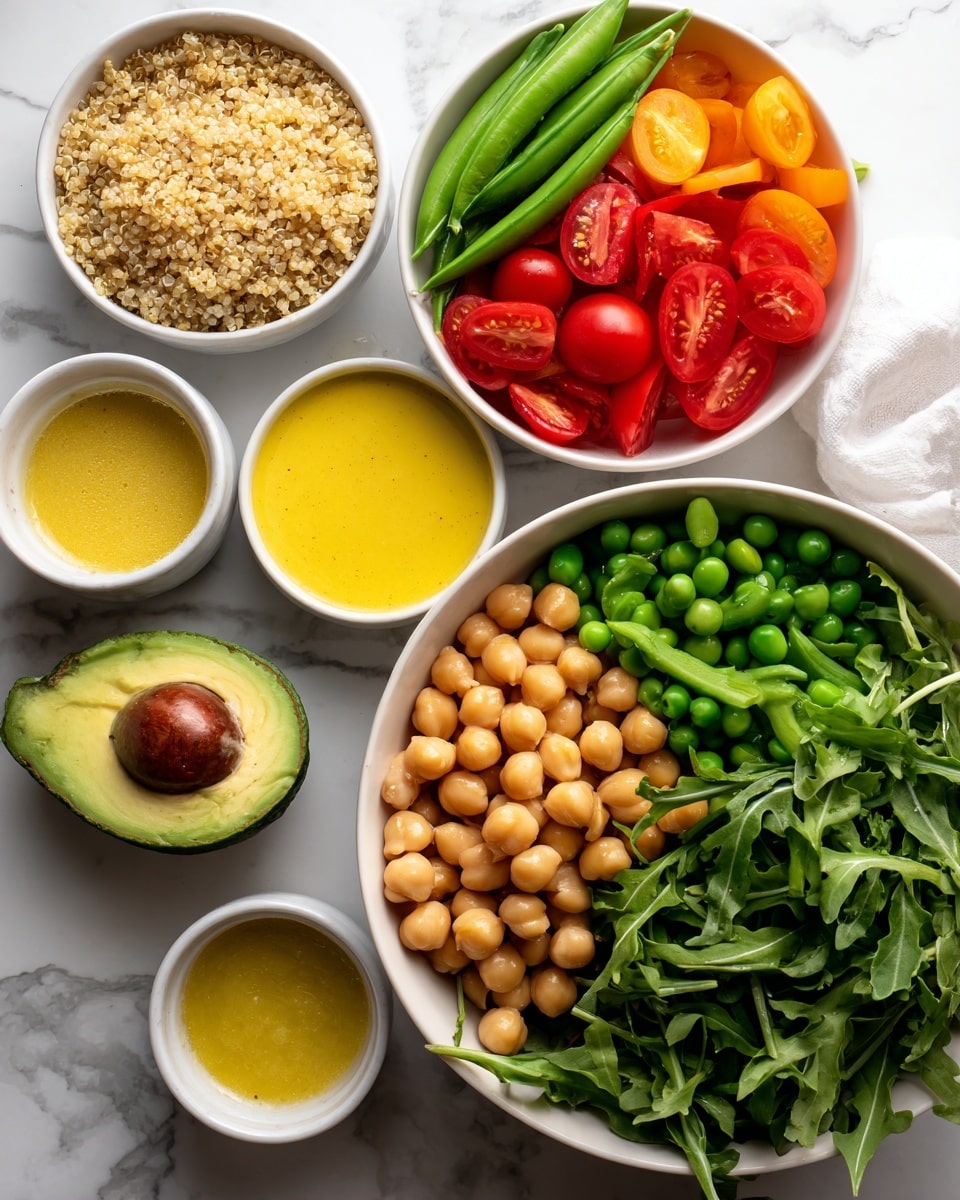 The image shows a white bowl filled with fresh green arugula leaves on the bottom right. Surrounding it are several small white bowls holding bright yellow dressing, cooked chickpeas, green snap peas, cherry tomatoes, and roasted red pepper slices layered neatly. A halved avocado and cooked quinoa are placed on a white marbled surface beside the bowls. Everything is arranged with a clean, fresh look, and the colors are vibrant and natural. Photo taken with an iphone --ar 4:5 --v 7