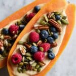 Loaded Papaya Breakfast Bowl with Greek Yogurt, Berries, Granola, and Nut Butter Recipe