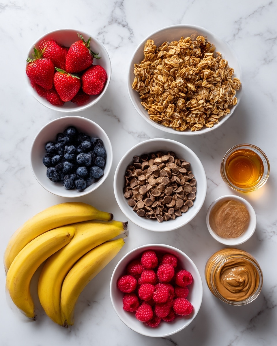 The image shows several white bowls filled with different ingredients arranged neatly on a white marbled surface. From left to right and top to bottom: a white bowl with bright red strawberries, a white bowl filled with golden-brown granola, a white bowl with small dark blueberries, a white bowl with light brown mini chocolate chips, a white bowl filled with red raspberries, a white bowl holding smooth light brown almond butter, and a bunch of three yellow bananas resting at the bottom left. On the top right, there is a small clear container with golden maple syrup. Each ingredient is distinct in color and texture, with no mixing, making a colorful and organized display. Photo taken with an iphone --ar 4:5 --v 7