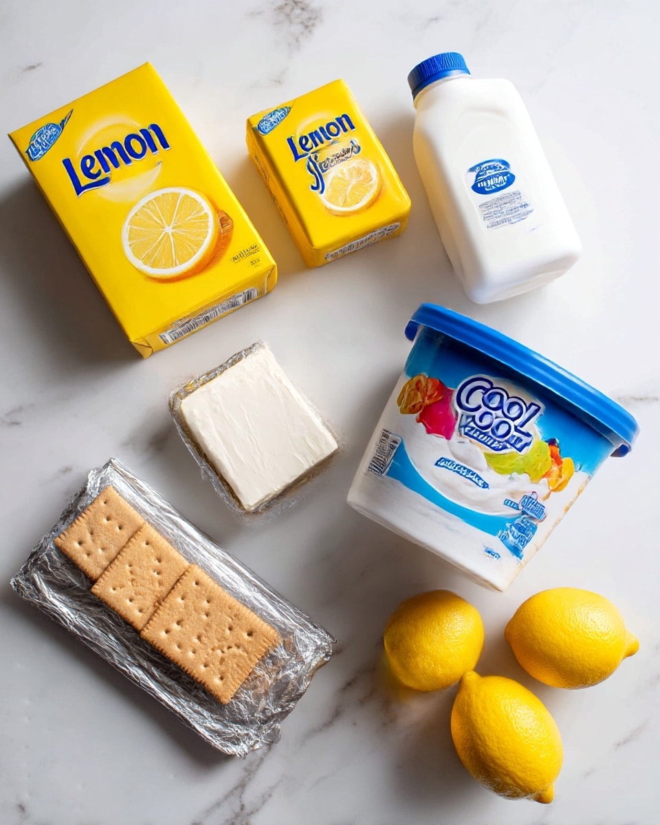 The image shows ingredients laid out on a white marbled surface. There are two yellow boxes of lemon Jello on the left, next to an open pack of light brown graham crackers. Below is a silver-wrapped block of cream cheese. In the center, a white plastic milk jug with a blue label is placed upright. To the right, two whole yellow lemons rest near a large white container of Cool Whip with a blue lid and colorful labels on top. The overall setting is bright and clean with all items clearly visible and spaced apart photo taken with an iphone --ar 4:5 --v 7