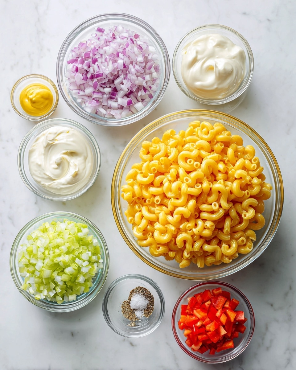 The image shows seven clear glass bowls arranged on a white marbled surface. The largest bowl on the right holds bright yellow elbow macaroni, fully cooked and slightly shiny. To the left, a medium bowl contains finely chopped red onion with a light purple and white color. Below it, a smaller bowl has pale green chopped celery. Next to that, a bowl with a creamy white texture holds sour cream, and to the left of that is another bowl with smooth mayonnaise that is off-white in color. Above the sour cream, a tiny bowl contains a small dollop of yellow Dijon mustard. Below the celery and mustard are two very small clear bowls, one with fine black pepper and the other with white salt. Another medium bowl on the bottom right holds finely diced bright red pepper. Each ingredient is neatly separated and clearly visible in its own bowl. photo taken with an iphone --ar 4:5 --v 7