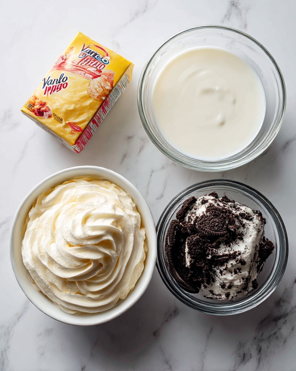 The image shows four separate items on a white marbled surface, each labeled. On the top left is a small box of vanilla Jell-O instant pudding mix with yellow and red colors. To the right of that is a clear glass bowl filled with white whole milk. Below the pudding mix is a white bowl holding smooth, fluffy whipped topping in a swirl pattern. On the bottom right is a clear glass bowl filled with dark black and white crushed Oreo cookies with rough textures. The view is from above for a clear, organized look. photo taken with an iphone --ar 4:5 --v 7