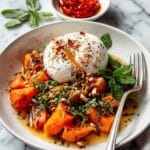 Roasted Pumpkin with Burrata, Hazelnuts, and Pesto Recipe