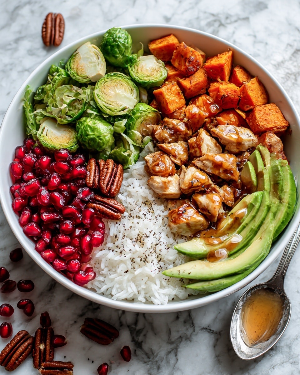 A white bowl is filled with a base of white rice, topped with five distinct layers arranged in separate sections: bright red pomegranate seeds at the front, followed by glossy pecans to the left, then green Brussels sprouts with a slight char on top, golden brown grilled chicken slices glazed with a shiny sauce in the center, soft orange roasted sweet potato chunks to the right, and a fan of sliced green avocado on the far right side. The bowl is placed on a white marbled surface, with a spoon holding some light brown sauce on the left side and scattered pomegranate seeds around. The scene is lit naturally, showing texture in each ingredient, photo taken with an iphone --ar 4:5 --v 7